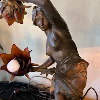 Dozens of antique table lamps from the art deco and art nouveau periods. 