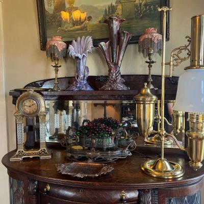 Dozens of antique table lamps from the art deco and art nouveau periods. 
