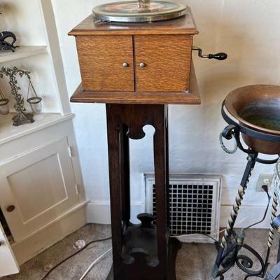 Victor hand crank record player - works well! Sound doors on front open and close to moderate sound level.