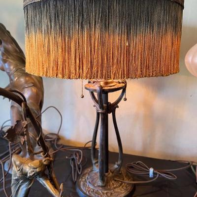 Dozens of antique table lamps from the art deco and art nouveau periods. 