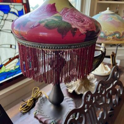 Antique art nouveau electric lamp with beautiful pink and yellow floral glass shade with beaded trim, with a P&S switch. 