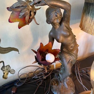 Dozens of antique table lamps from the art deco and art nouveau periods. 
