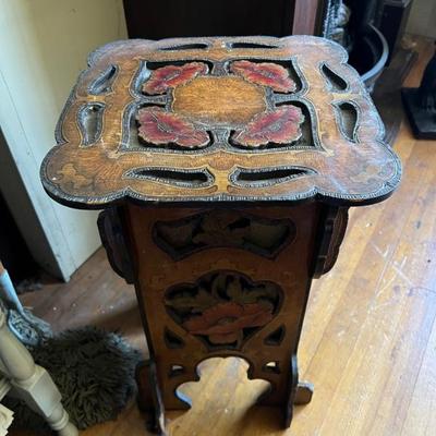 Antique carved sewing table