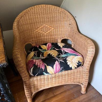 Newer nice condition wicker chairs with matching vintage floral cushions 