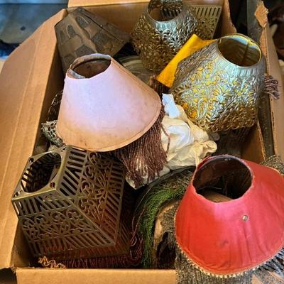 Boxes and boxes of antique lamp parts, shades, beads, and more, throughout all home levels.