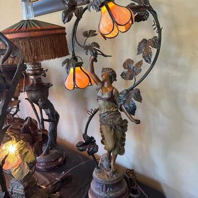 Dozens of antique table lamps from the art deco and art nouveau periods. 