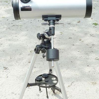 Meade telescope on tripod