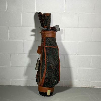 GOLD CLUBS & DAIWA GOLF BAG | Includes: TaylorMade Chaska driver, TaylorMade putter, Rawlings putter, and a full set of Daiwa clubs with...