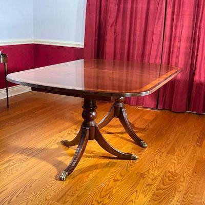 DOUBLE PEDESTAL DINING ROOM TABLE | Duncan Phyfe style dining table, mahogany with inlay top, double pedestal base, and two leaves. - l....