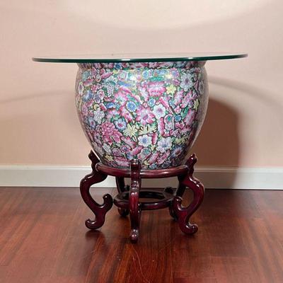 CHINESE GARDEN URN TABLE | Large Chinese jardiniere / planter with allover enamel floral decoration and a fancy goldfish decorated...