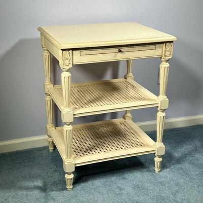 CANE SIDE TABLE | Three tier end table in white/cream paint with two caned shelves and a pullout shelf / writing surface on top with...