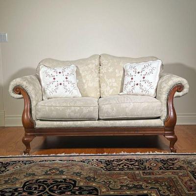 BROYHILL FRENCH STYLE LOVESEAT | Broyhill French Style sofa of small size with Cream damask upholstery. - l. 66 x w. 37 x h. 35 in