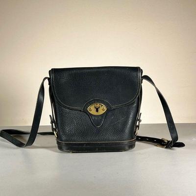 DOONEY & BOURKE LEATHER BAG | Black All Weather Leather shoulder bag with firm base & brass pegs on bottom. - l. 8.5 x w. 3 x h. 9 in