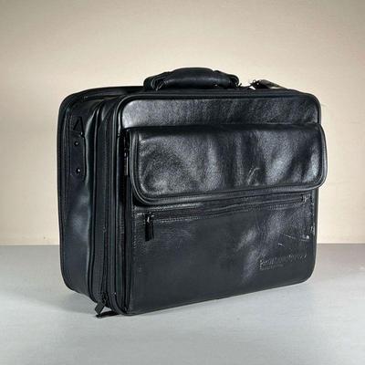 TRAVELWELL LEATHER COMPUTER CASE | Genuine leather computer case new with tag. Contains multiple pockets and storage options for laptops,...