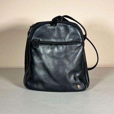 ETIENNE AIGNER LEATHER PURSE | Black leather backpack/purse. - l. 10 x h. 10 in