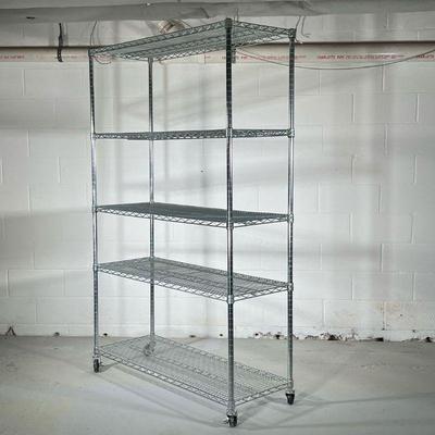 LARGE CHROME SHELVING UNIT | Large wheeled shelving unit with 5 grated shelves. - l. 48 x w. 18 x h. 75.5 in