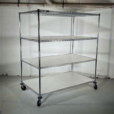 LARGE CHROME SHELVING UNIT | Tall & wide shelving unit on wheels with 4 grated shelves. - l. 59 x w. 35 x h. 67.5 in