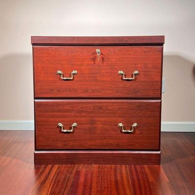 WOODEN FILING CABINET | Having two large drawers with lock and brass handles. - l. 30 x w. 20 x h. 30 in