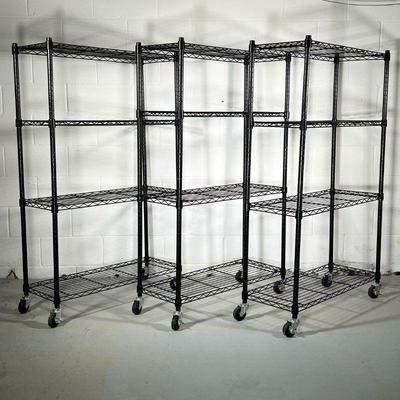 (3PC) BLACK ROLLING SHELVING UNITS | 3 black metal shelving units on casters, each containing 4 shelves. - l. 35.5 x w. 13.75 x h. 58 in
