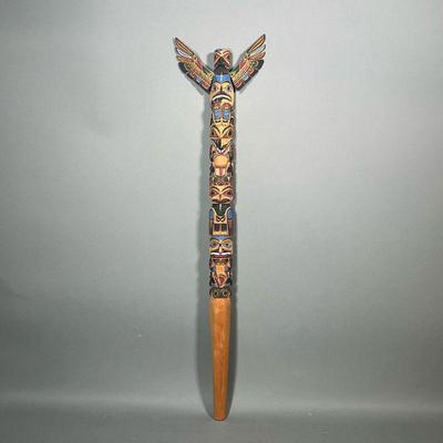 CARVED & POLY-CHROMED TOTEM | Carved and painted wood, with wing attachments, incised signature on back, â€œHarvey + Josie Williams...