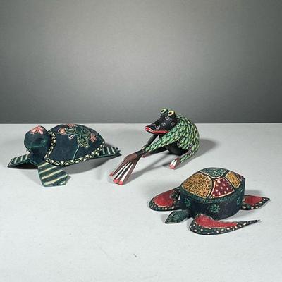 (3PC) CARVED AND PAINTED ANIMALS | Including two sea turtles and a little frog, the two turtles backs lift off to reveal boxes. - l. 7 in...