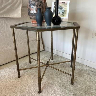 a pair of brass and glass faux bamboo end tables