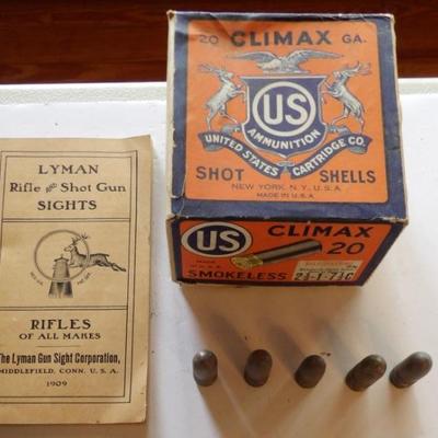 Shotgun advertising box, booklet and Civil War 58 caliber slugs.