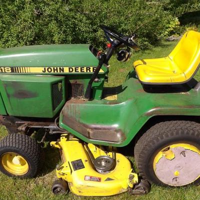 John Deere Model 319 tractor purchased in 1985. Meticulously maintained every year. Snow blower attachment included.