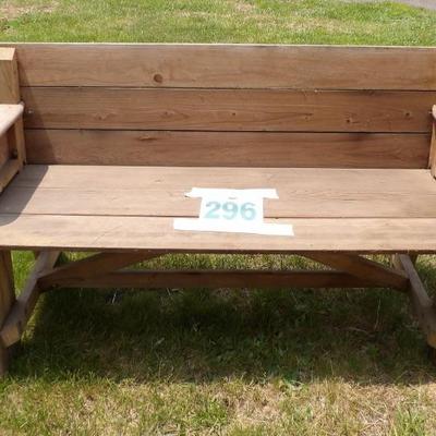 Metamorphic hardwood bench converts to single sided picnic table.