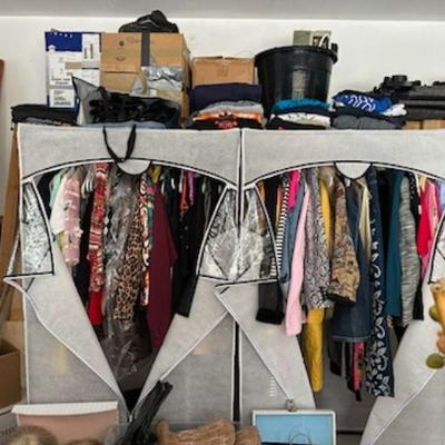 Two racks of women's clothes including animal print garments.