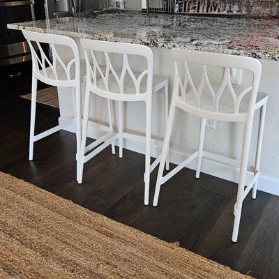 Fun white counter height bar stools from Elements in Cherry Creek