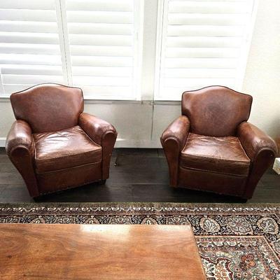 Set of two leather arm chairs