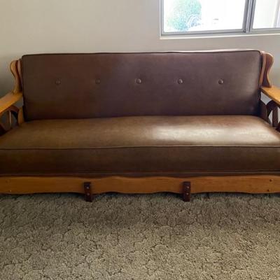 Leather 1950â€™s couch wagon wheel 