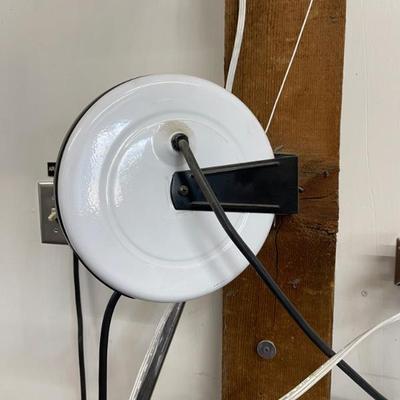 Extension cord wall holder 