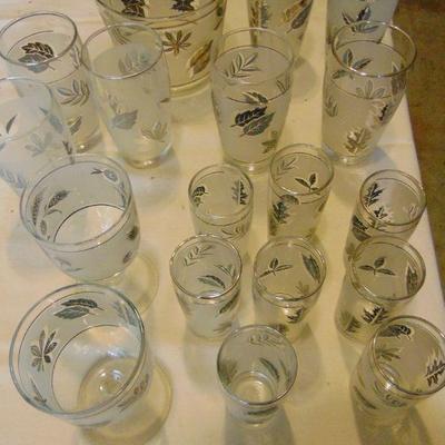 18 silver leaf cups, glasses & ice bowl
