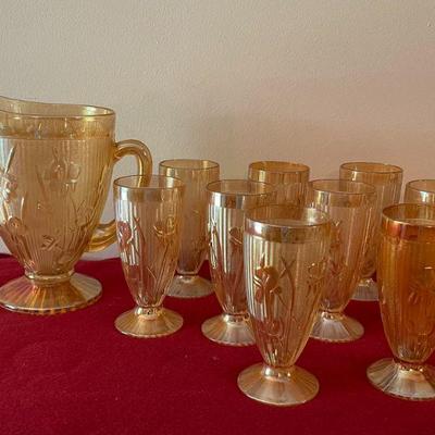 Carnival glass pitcher -9 glasses