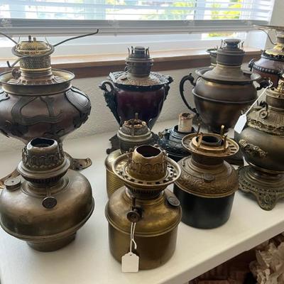 Amazing collection of antique kerosene lamp bases and parts from quality makers like B&H (Bradley and Hubbard)