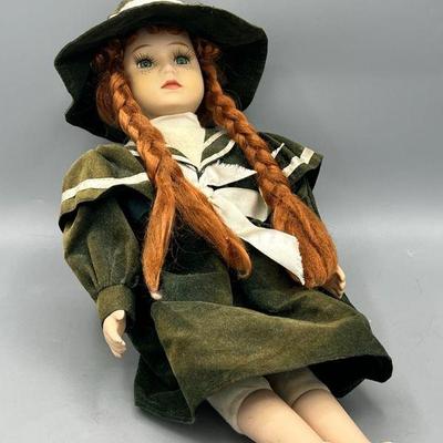 Antique Doll In Green Dress
