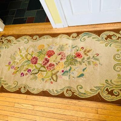 Vintage Hand Knotted Rug with Warm Floral Centerpiece
