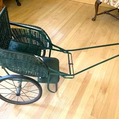 Antique wicker childâ€™s pull behind cart
