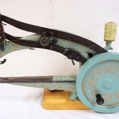 1028	ANTIQUE TABLE TOP CAST METAL SEWING MACHINE, LONG NECK, HAND CRANK, APPROXIMATELY 9 IN X 27 IN X 18 IN HIGH
