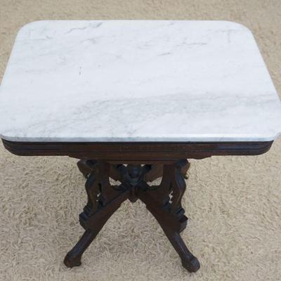 1188	WALNUT VICTORIAN MARBLE TOP PARLOR TABLE, BEVELED EDGE, APPROXIMATELY 27 IN X 19 IN X 31 IN HIGH
