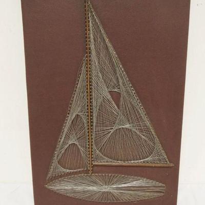 1256	MIDCENTURY MODERN WIRE STRING ART IN THE FORM OF A SAILBOAT ON LEATHER WRAPPED BOARD, APPROXIMATELY 16 IN X 25 IN
