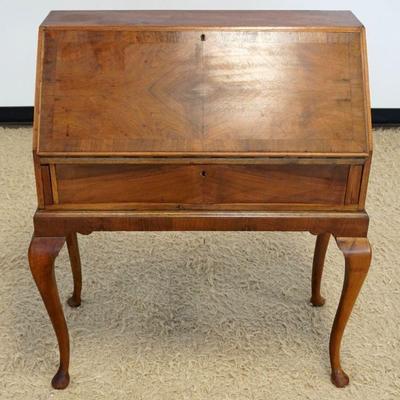 1179	WALNUT BOOK MATCHED DIAMOND VENEERED LADY'S WRITING DESK ON CABRIOLE LEGS, SOME STAINING ON TOP, APPROXIMATELY 35 IN X 18 IN X...