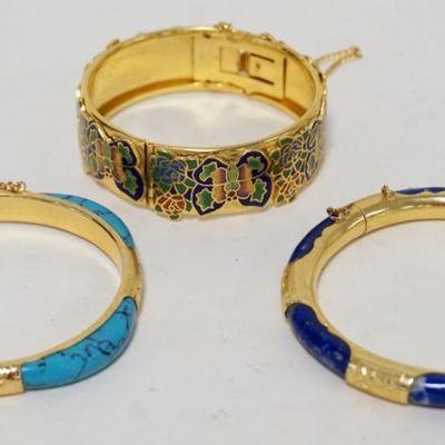 1111	3 GILT ENAMEL & STONE BRACELETS, LARGEST APPROXIMATELY 3 IN
