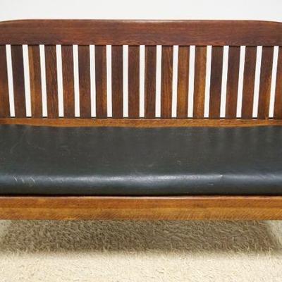 1211	MISSION OAK BENCH, APPROXIMATELY 69 IN X 28 IN X 37 IN HIGH
