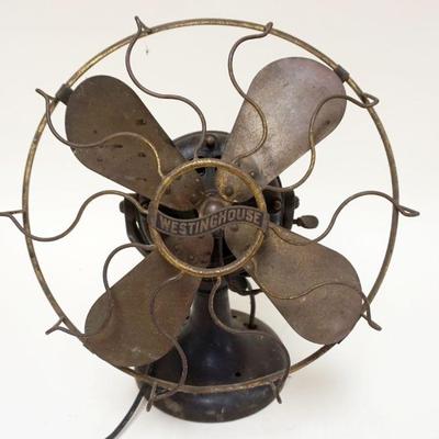 1135	ANTIQUE WESTINGHOUSE BRASS BLADE ELECTRIC FAN, APPROXIMATELY 18 IN HIGH
