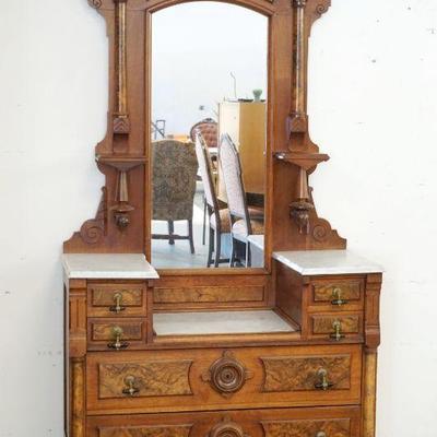 1184	ORNATE WALNUT VICTORIAN MARBLE TOP CHEST, 7 DRAWER W/BURL WOOD FRONT & COLUMNS & DROP CENTER, SECRET DRAWER AT BASE,...