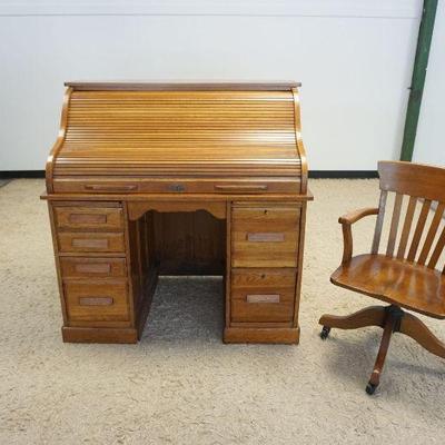 1251	OAK ROLL TOP DESK W/UNUSUAL FALL FRONT DESK DRAWER CONCEALING 3 SMALL DRAWERS, APPROXIMATELY 48 IN X 30 IN X 49 IN HIGH, HEYWOOD...