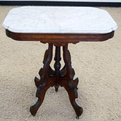 1191	WALNUT VICTORIAN MARBLE TOP PARLOR TABLE, APPROXIMATELY 28 IN X 20 IN X 30 IN HIGH

